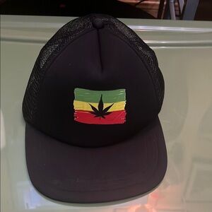 Black Trucker Hat with Rasta Leaf Design